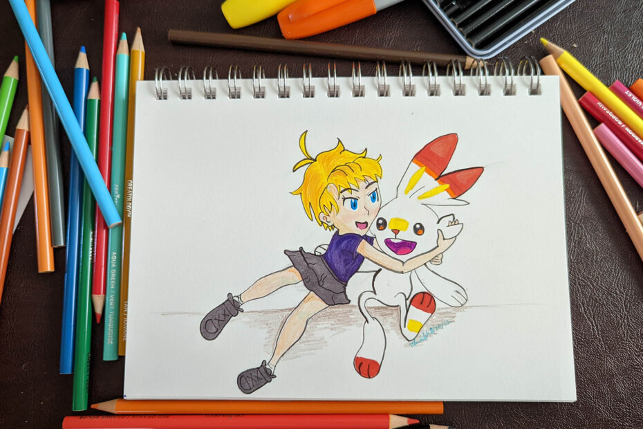 Photo of a drawing in a sketchbook depicting a custom character snuggling up to a Scorebunny.